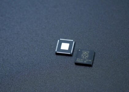 a couple of microchips sitting on top of a table